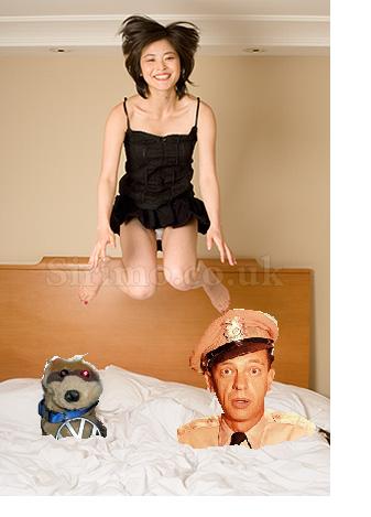 Garrisonskunk-woman_bouncing_on_bed